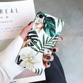 Soft TPU phone case with detailed banana leaf and floral art design for iPhone, shown in flower leaves colour.