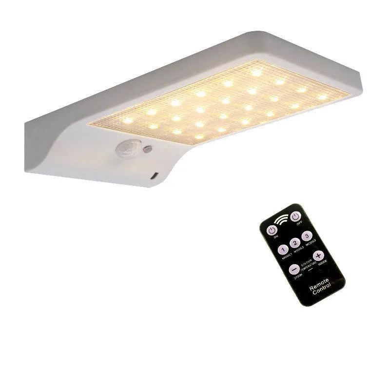 Black and white solar garden light with waterproof IP65 rating for outdoor courtyard and balcony use