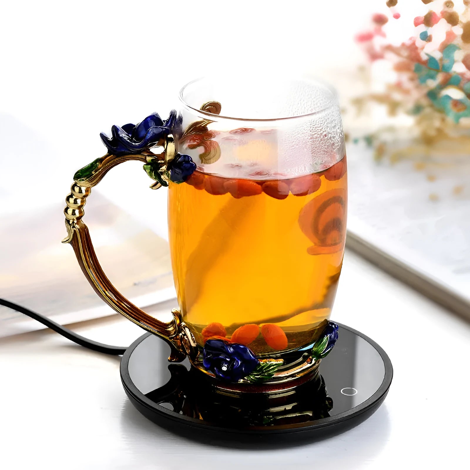 Black circular mug warmer with tempered glass surface and temperature switch