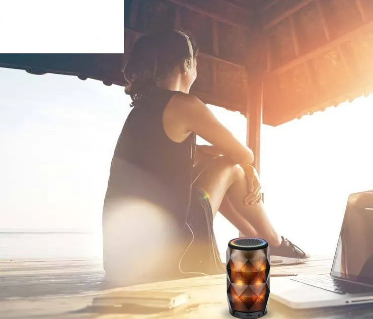 Black crystal diamond-cut Coke can shaped lantern and Bluetooth speaker with colourful LED lights.