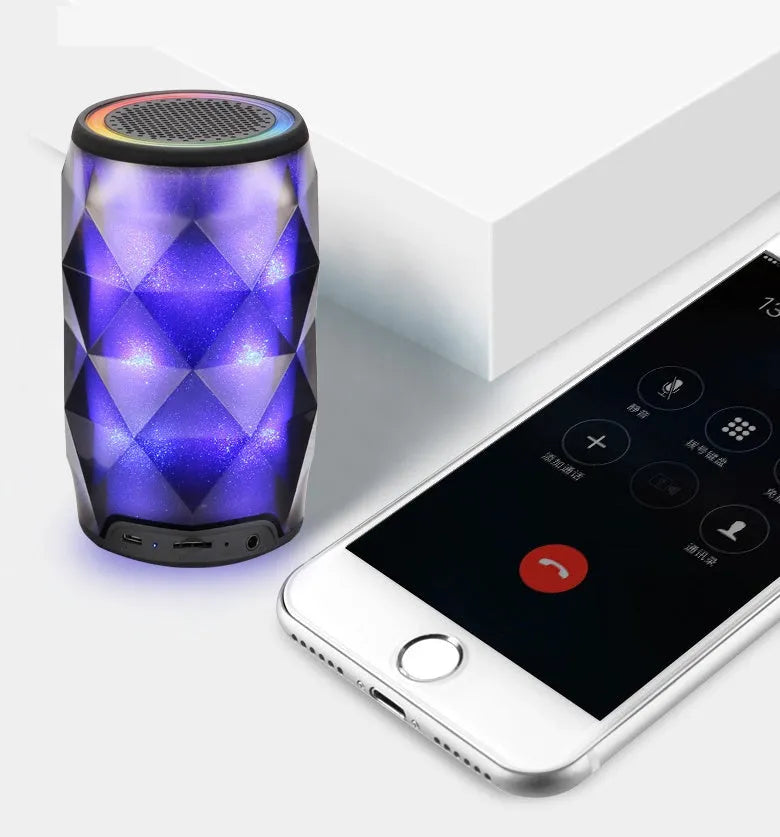Black crystal diamond-cut Coke can shaped lantern and Bluetooth speaker with colourful LED lights.