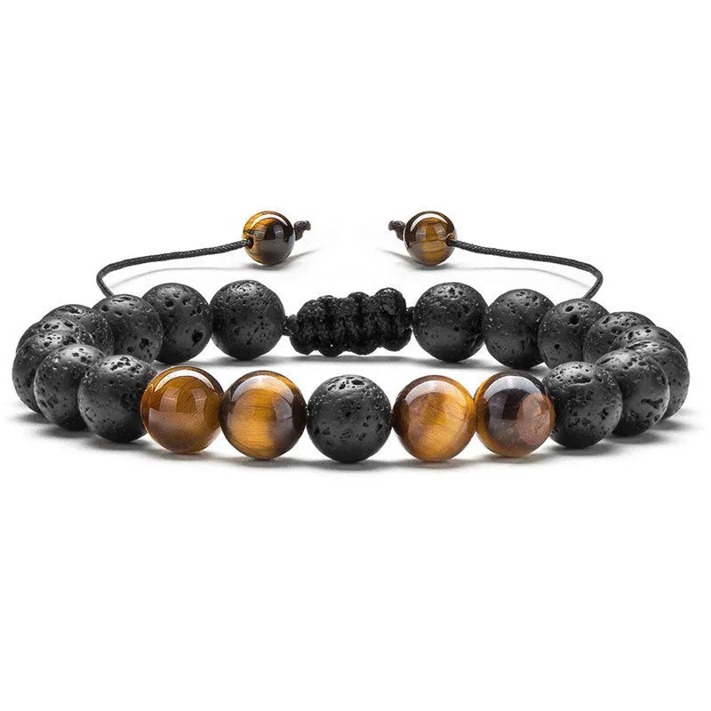 Matte black agate tiger eye bead couple bracelets with geometric design on a neutral background.