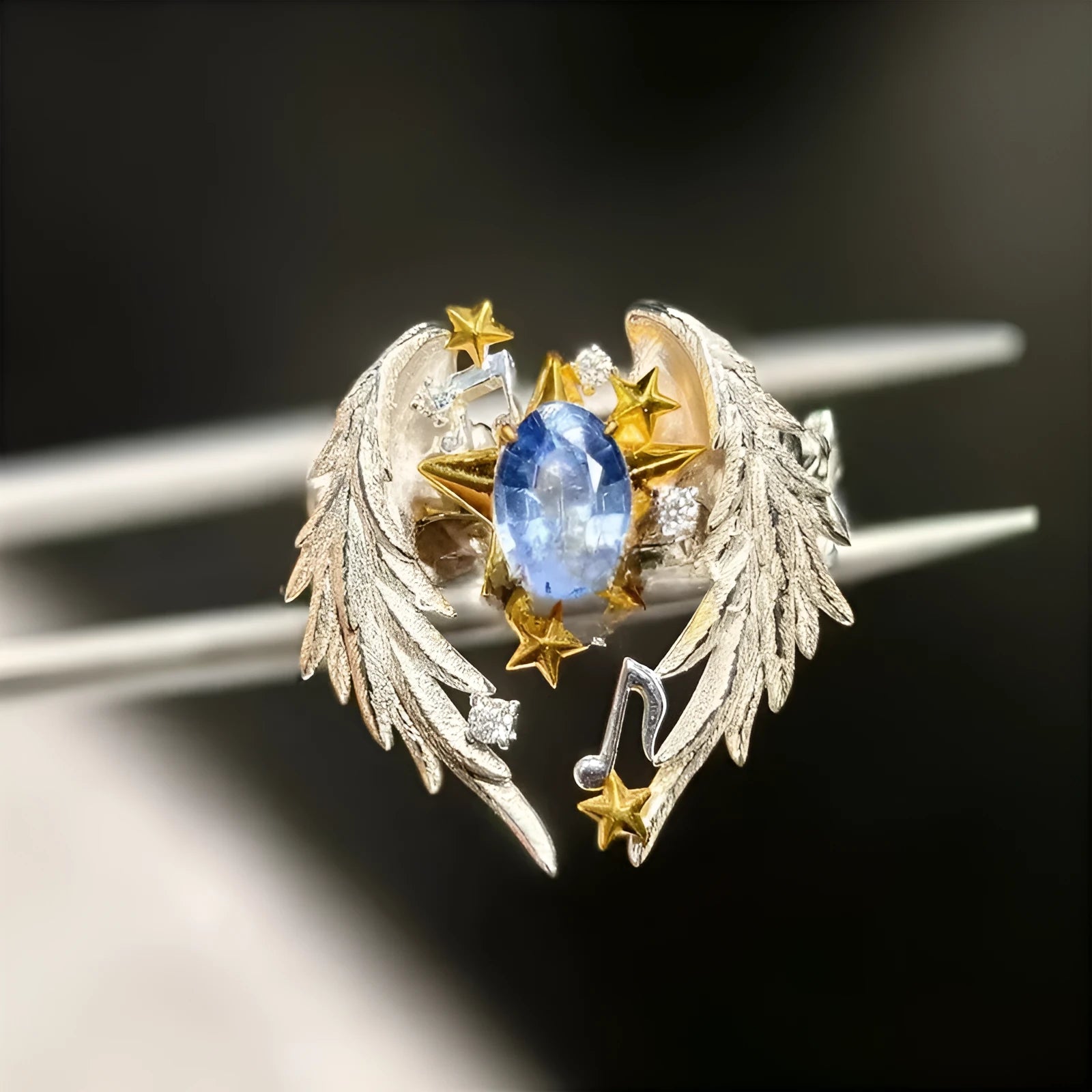 Adjustable geometric angel wings ring in alloy with open mouth design