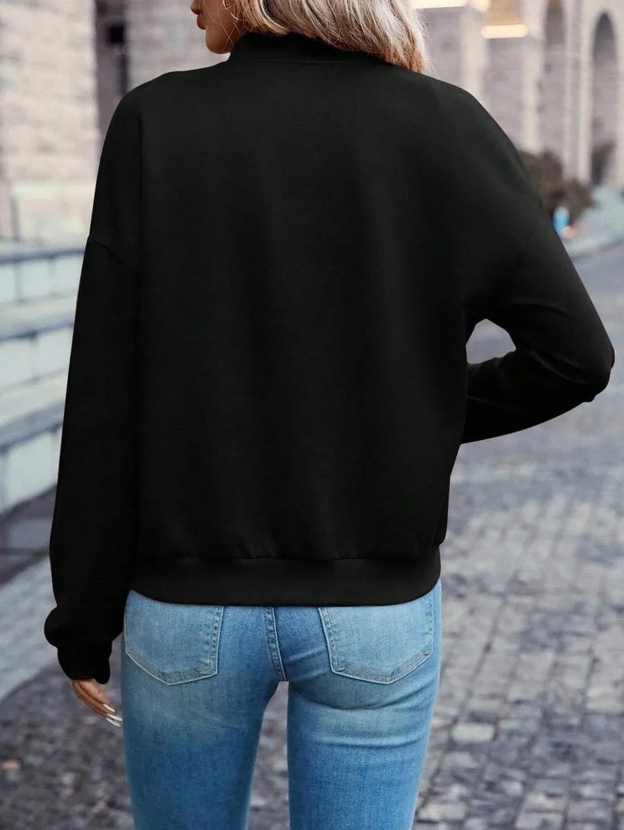 Black women's long sleeve zip jacket with faux pockets, casual style.