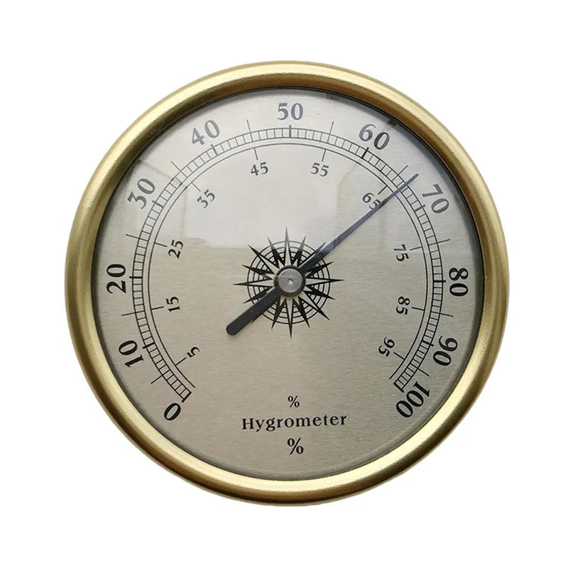 Analog thermometer and hygrometer with silver aluminum outer ring and dial on a white background