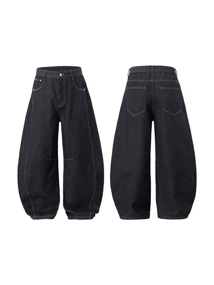 Men's wide leg denim trousers in original cow colour showing mid-waist design and relaxed fit