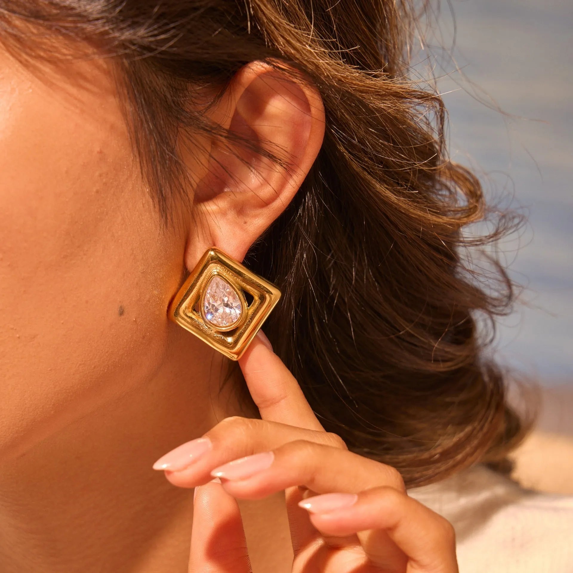 Gold geometric water drop zircon stud earrings with 18K electroplated finish