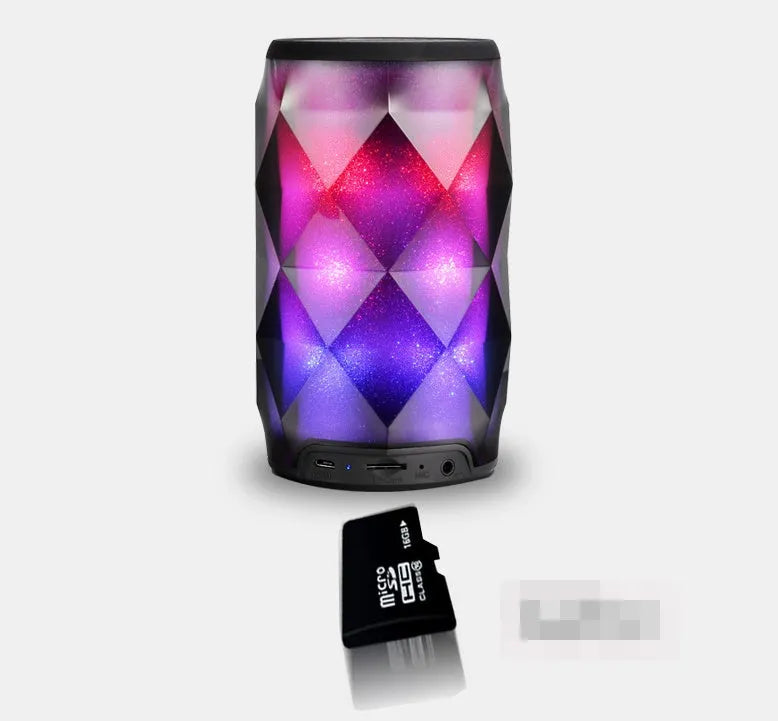 Black crystal diamond-cut Coke can shaped lantern and Bluetooth speaker with colourful LED lights.