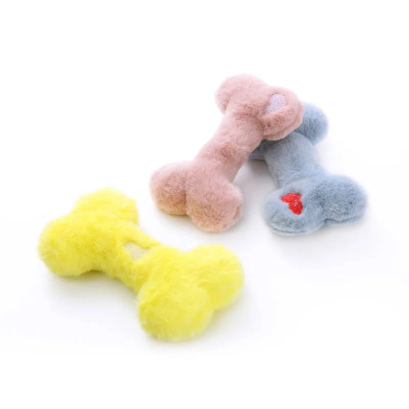 Blue love bone shaped plush dog toy with squeaker for biting and chewing.
