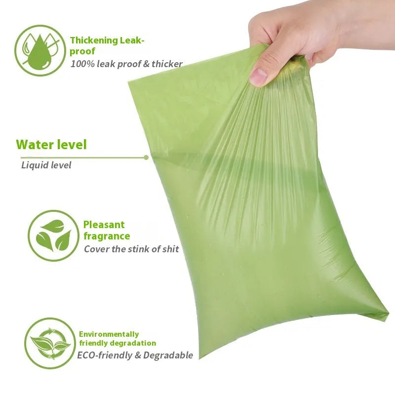 Rolls of green, black, blue, purple, and orange EPI degradable pet poo bags with a plastic dispenser.