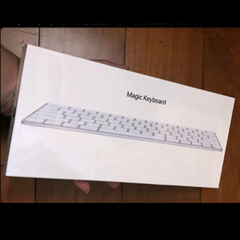 Apple G6 Bluetooth wireless keyboard in white colour with ultra-thin metal construction and multimedia function keys