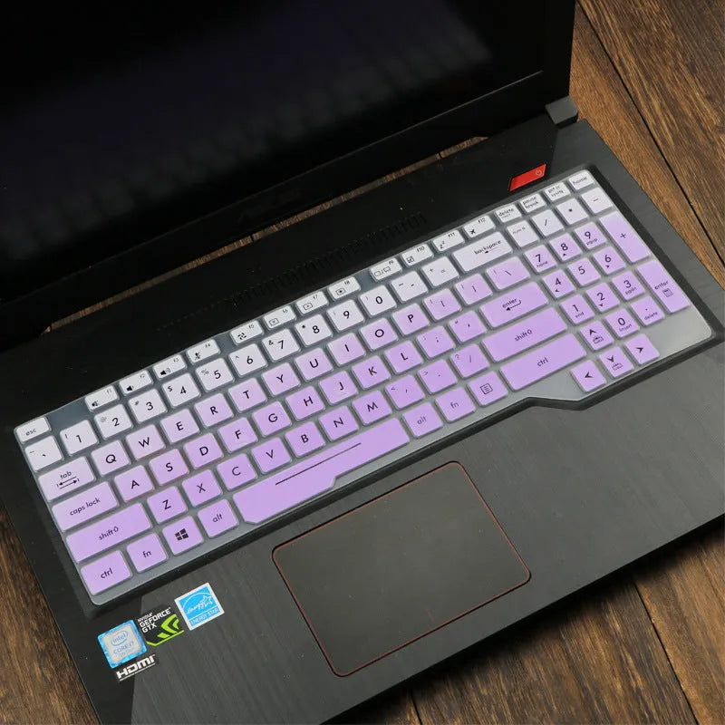 ASUS Flight laptop keyboard protective film cover shown in a translucent colour option on a laptop.
