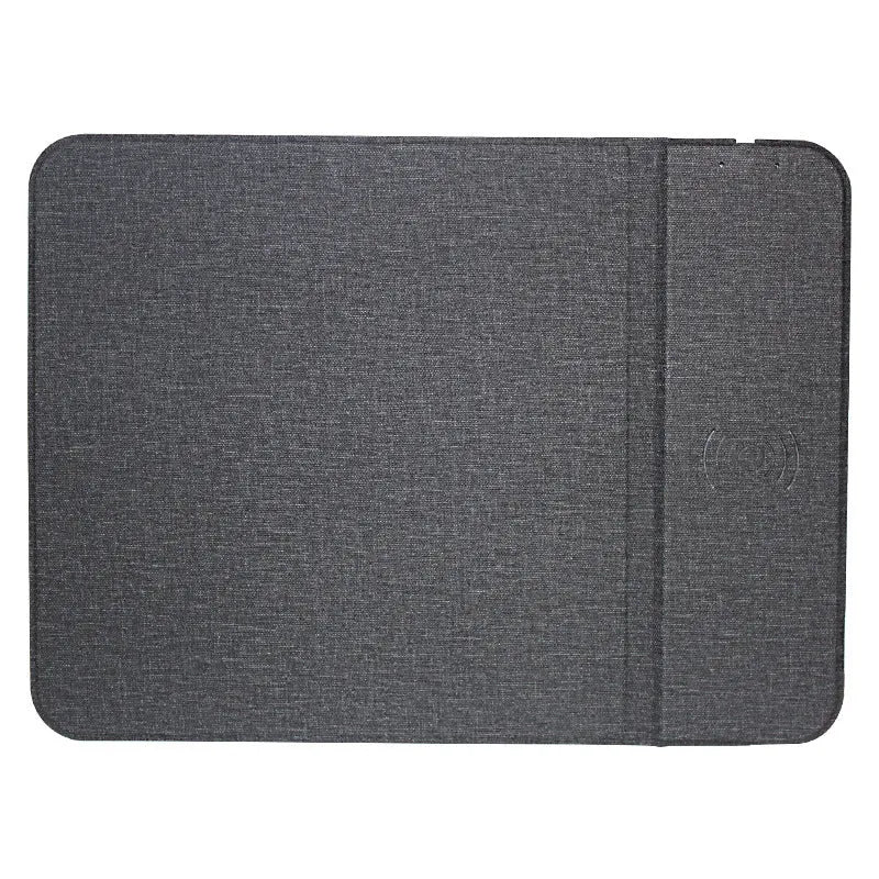 Foldable cloth phone holder with wireless charging pad showing fabric surface and compact folded design