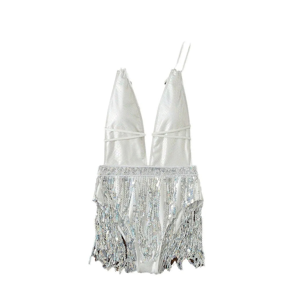 White deep V-neck women's swimsuit with tassel trim on briefs-style bottom