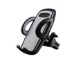 Black car air vent mobile phone holder attached to air conditioning outlet holding smartphone