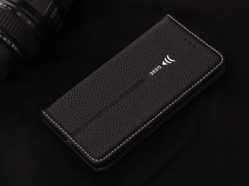 Black PU leather wallet-style case open to show card slots, next to an iPhone.