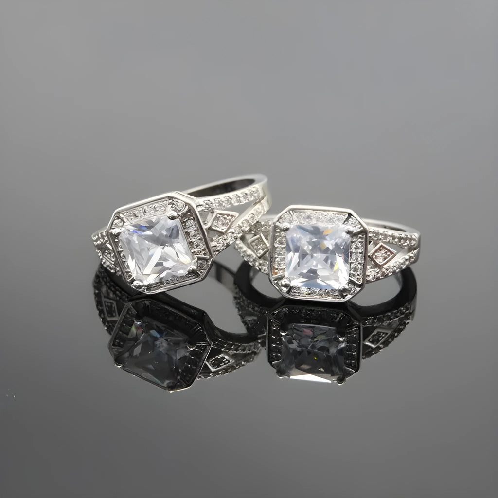 Platinum colour geometric zircon ring with hollow quadrilateral design on finger