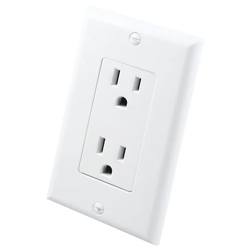 White plug-in LED sensor night light installed in a wall socket