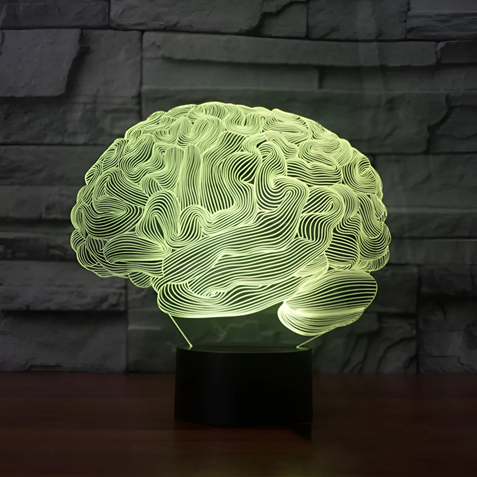 Brain-shaped 3D illusion LED desk lamp with multicolour light projection on acrylic plate and remote control.