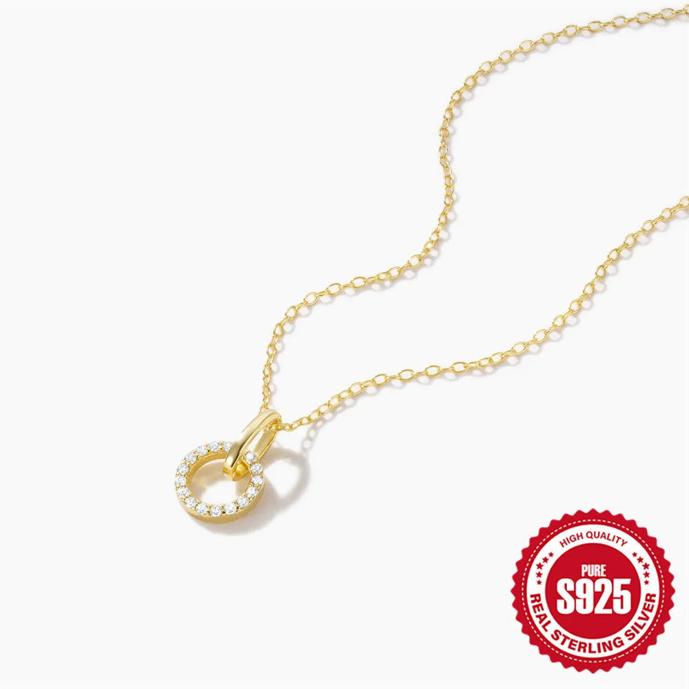 Gold colour S925 sterling silver clavicle chain necklace with a round zircon pendant on an adjustable chain.