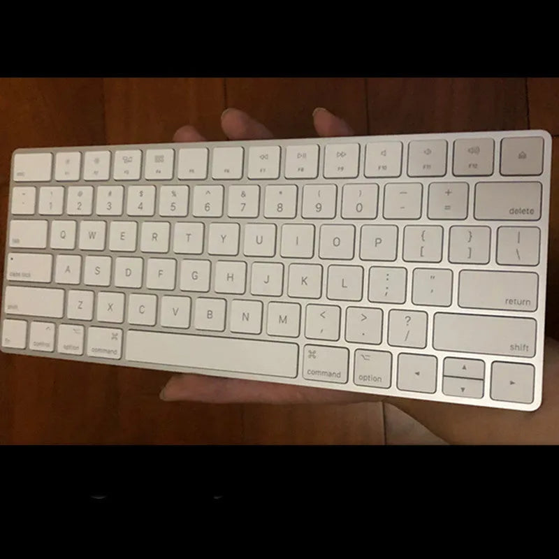 Apple G6 Bluetooth wireless keyboard in white colour with ultra-thin metal construction and multimedia function keys