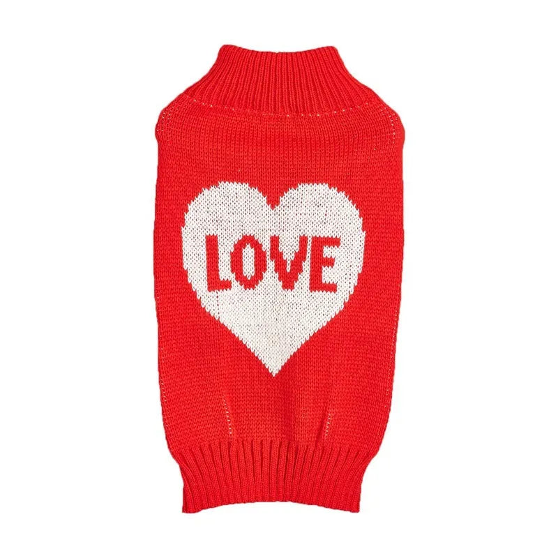 Red love heart design on a pink acrylic dog sweater for a small dog.