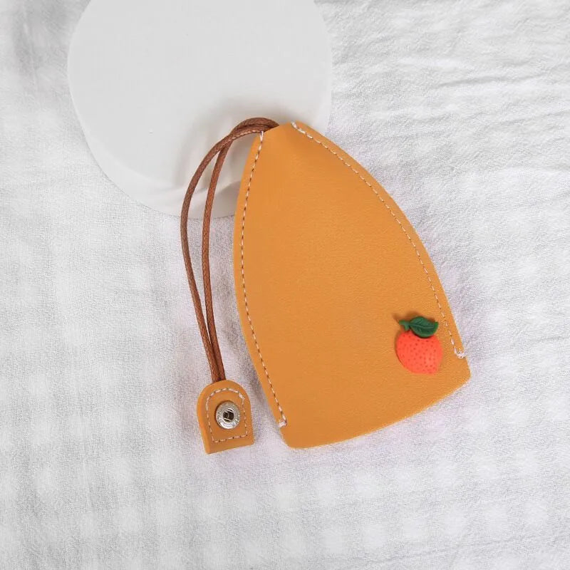 Cartoon-themed PU leather car key case with pull-out mechanism measuring 14x7.5 cm