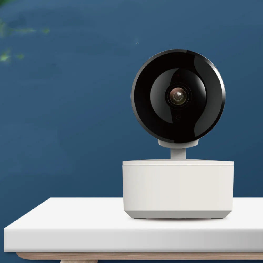 Indoor WiFi security camera with pan and tilt function on a desktop.