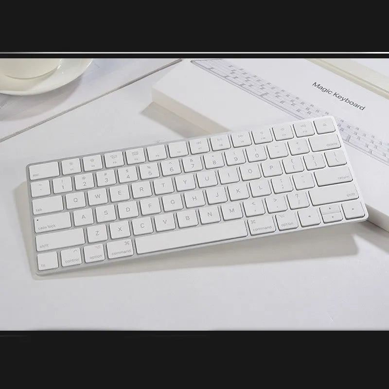 Apple G6 Bluetooth wireless keyboard in white colour with ultra-thin metal construction and multimedia function keys