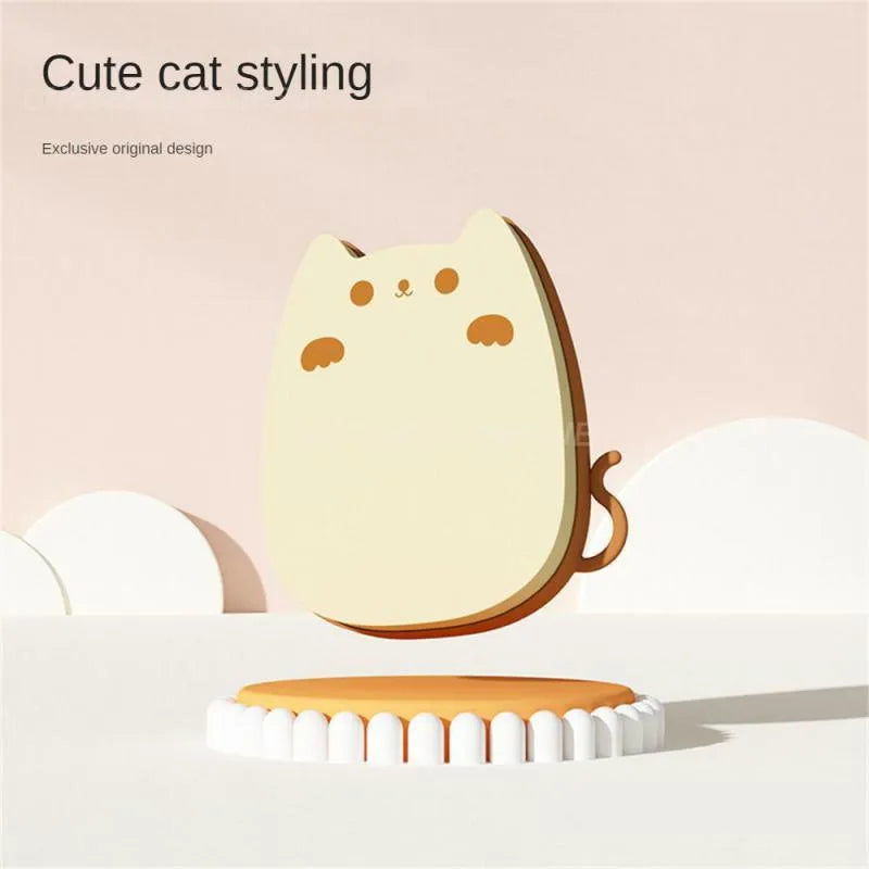 Brown blue green sponge silicone pet grooming comb for cats and dogs measuring 11.5 by 10 centimetres