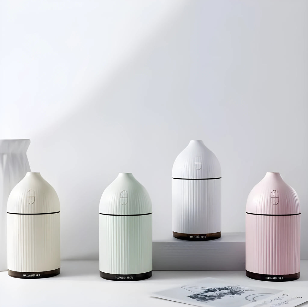 White ultrasonic aromatherapy diffuser with humidifier function and LED light, 80mm diameter