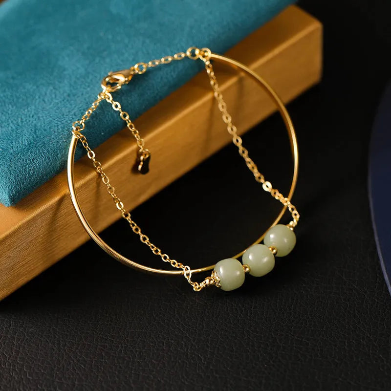 Jade lucky beads bracelet for women with gold inlay, shown in single, double, and three bead versions.