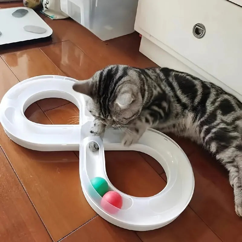 Blue and white cat turntable toy with rotating track ball and teasing stick for feline play