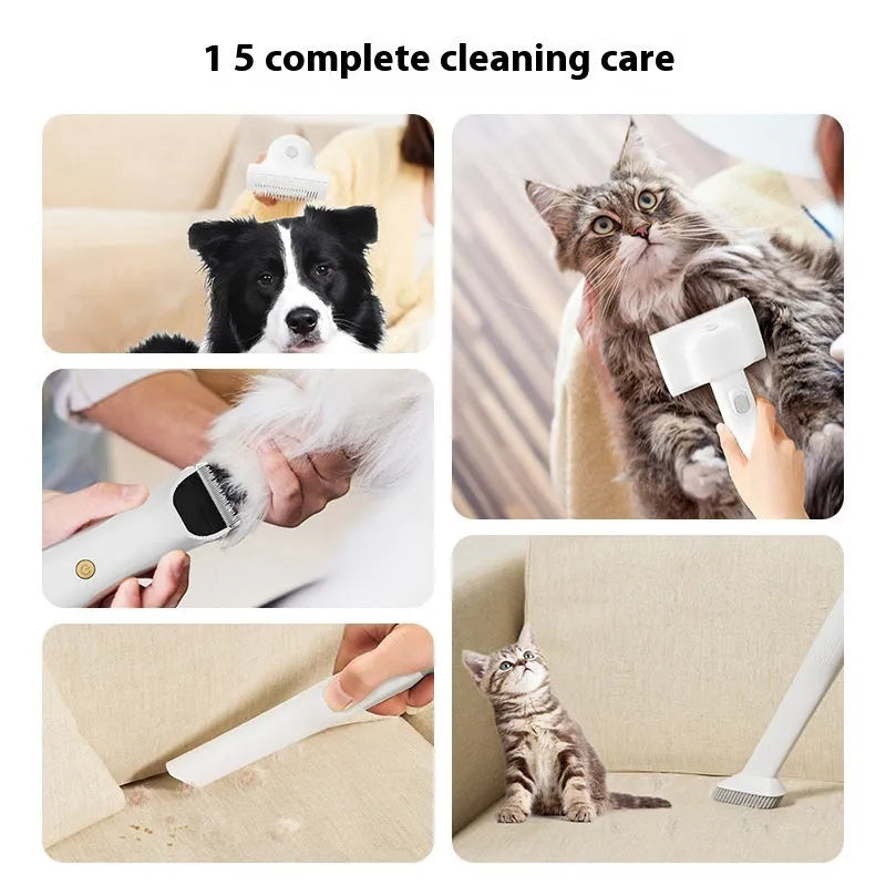Pink and white pet grooming vacuum cleaner with electric shear and hose attachments on a white background