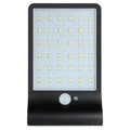 Black and white solar garden light with waterproof IP65 rating for outdoor courtyard and balcony use