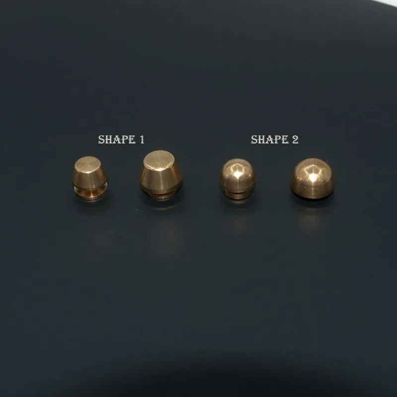 Brass decorative buckle foot nails in round and bucket styles measuring 10mm and 12mm