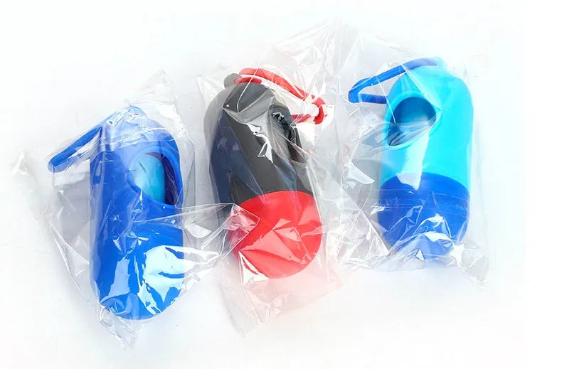 Roll of coloured dog poop bags showing size of 22.5 by 30 centimetres.