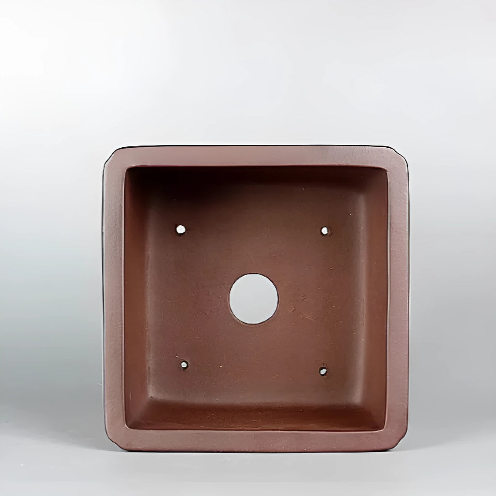 Handmade brown antique purple clay flower pot with classical style.