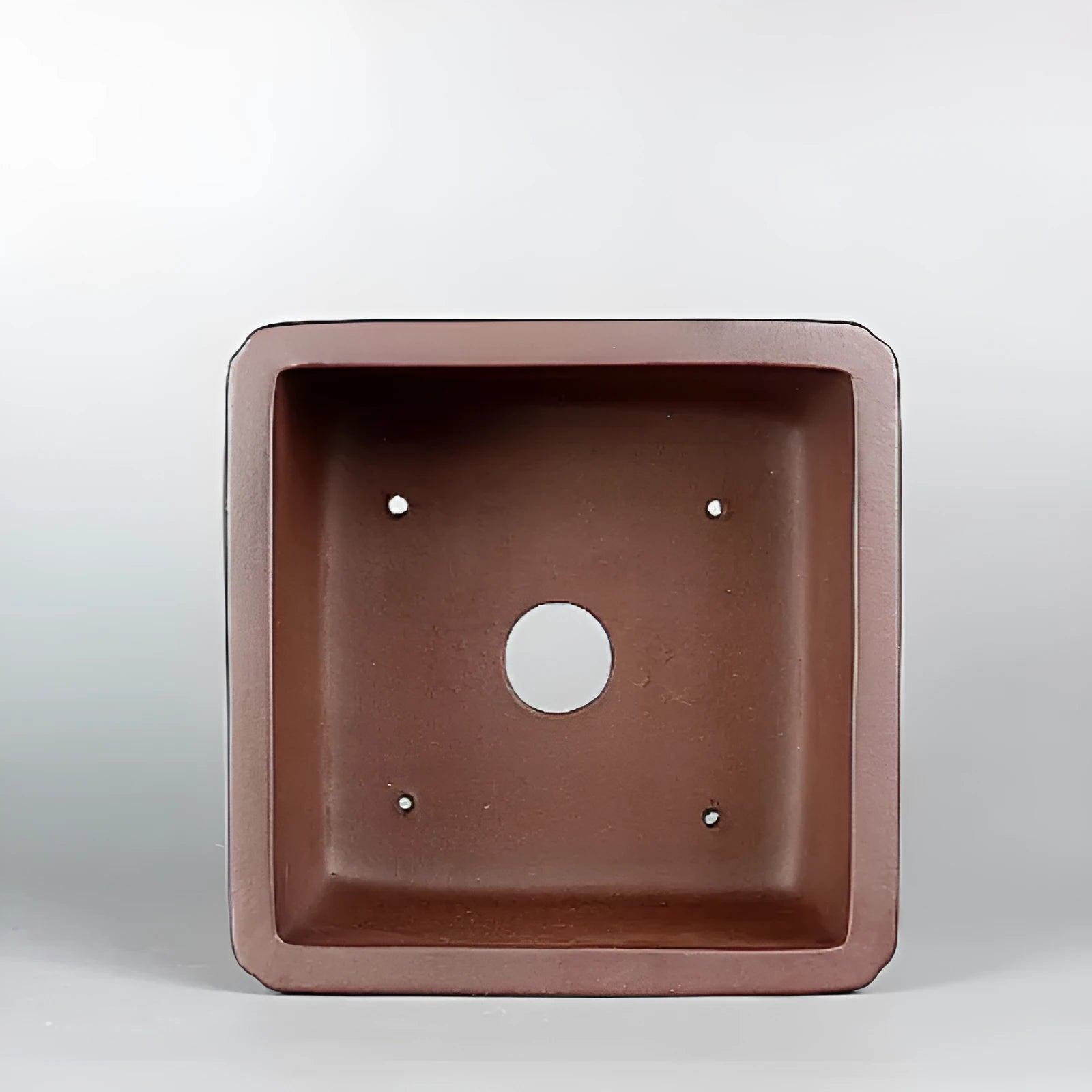 Handmade brown antique purple clay flower pot with classical style.