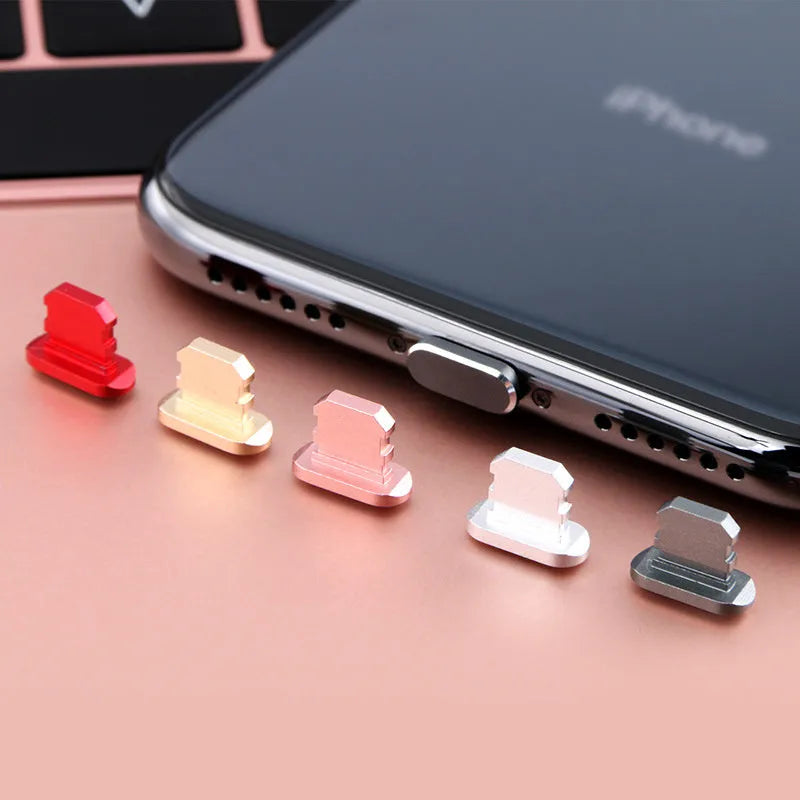 Aluminium alloy mobile phone charging port dust plug for iPhone, shown in a metallic colour.