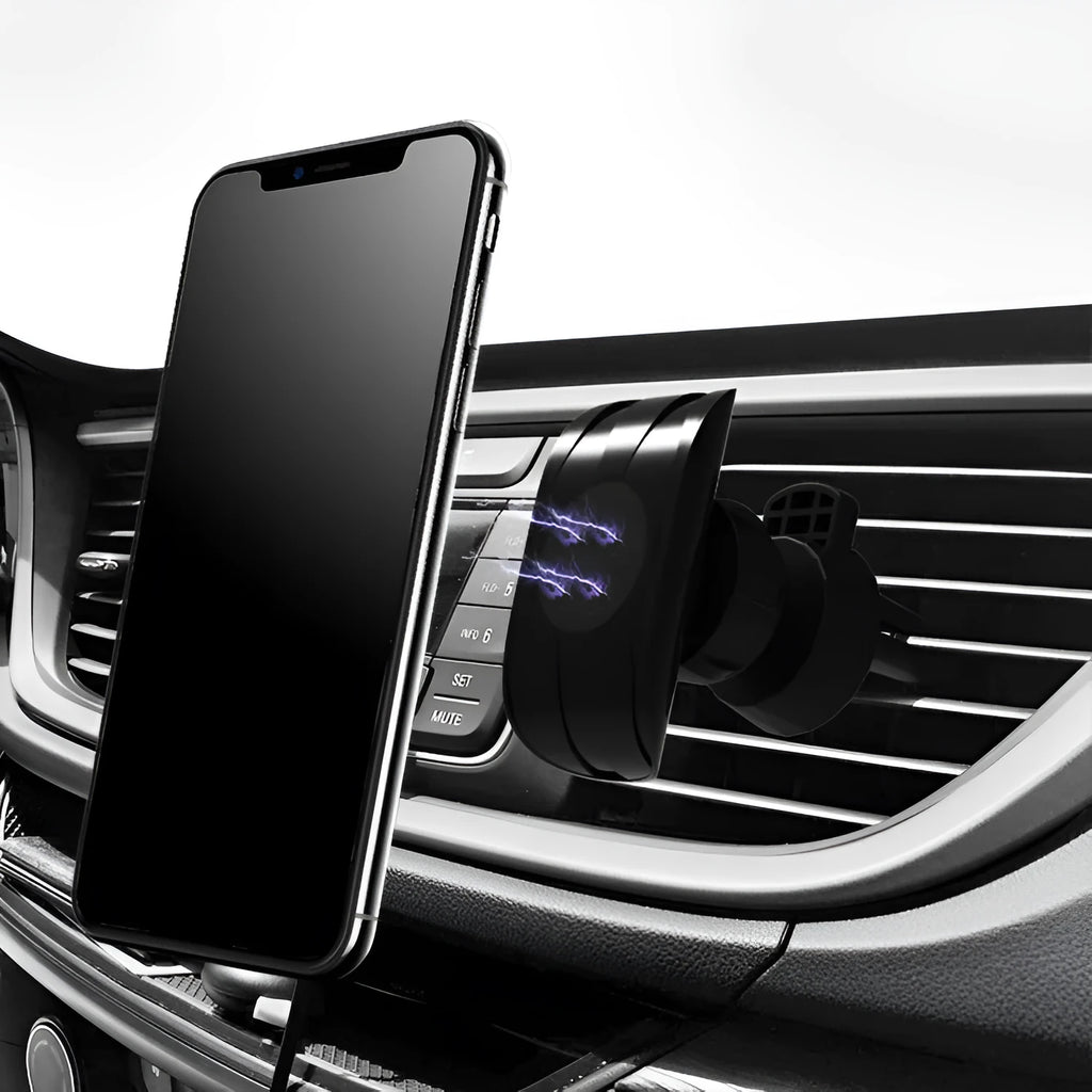 Black car phone holder attached to vehicle air vent holding smartphone