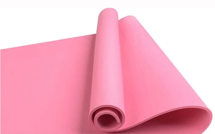 EVA fitness yoga mat in blue, showing its texture and thickness, rolled up with its OPP storage bag.