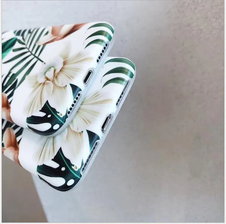 Soft TPU phone case with detailed banana leaf and floral art design for iPhone, shown in flower leaves colour.