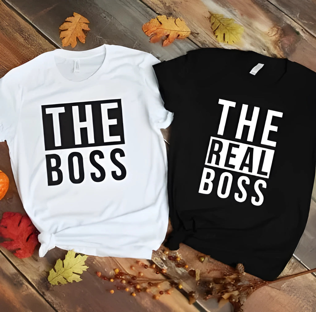 Man's loose fit round neck t-shirt with a graphic print, short sleeves, on a white background.
