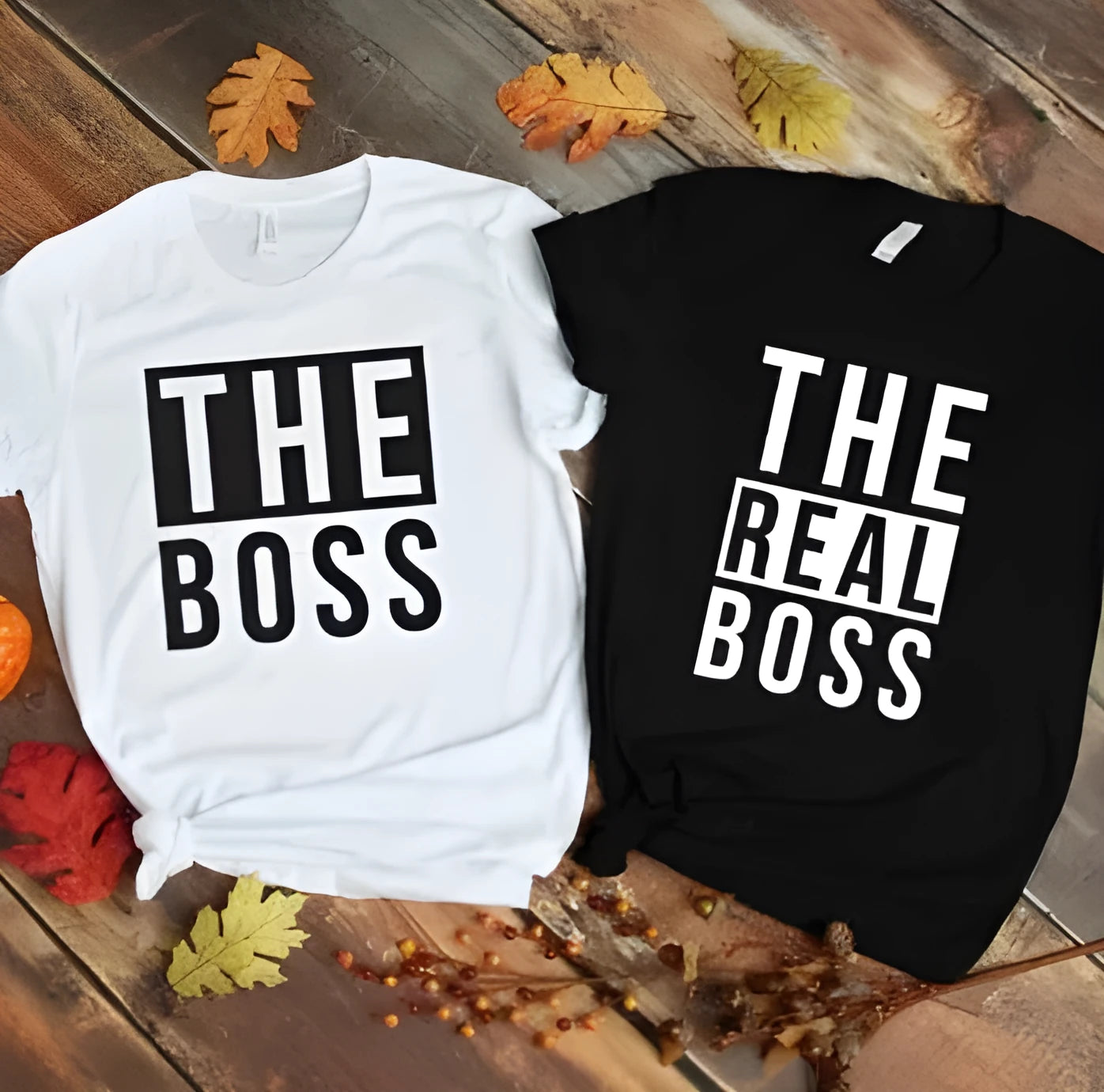 Man's loose fit round neck t-shirt with a graphic print, short sleeves, on a white background.
