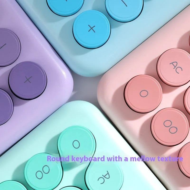 Desk calculator with gradient colour design in violet, pink, blue, or green on a white background.