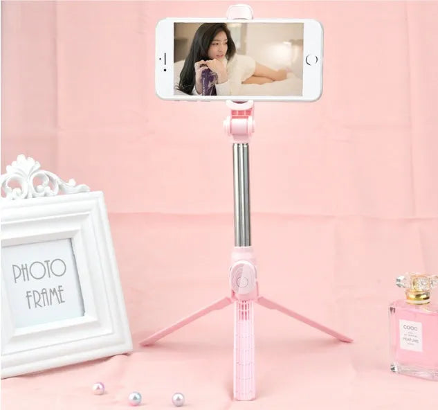 Black iPhone tripod selfie stand with extended aluminium rod and Bluetooth remote control