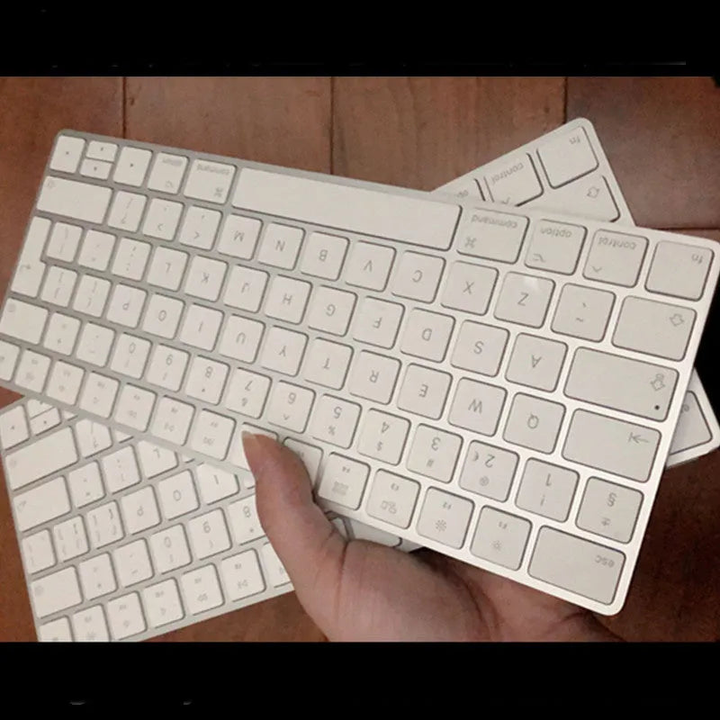 Apple G6 Bluetooth wireless keyboard in white colour with ultra-thin metal construction and multimedia function keys