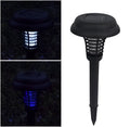 Black solar-powered mosquito killer lamp with white and purple LED lights for garden insect control.