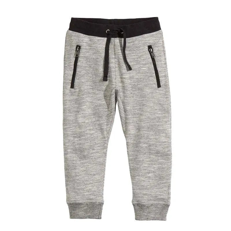 Casual cotton two-piece clothing set for a boy, featuring a long-sleeved T-shirt with letter print and matching trousers.